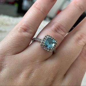 Blue topaz, cubic zirconia (diamond stimulant), & sterling silver ring. Size 7.5